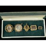 Four Victorian brooches and pendant.