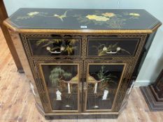 Oriental black lacquered floral and figure decorated canted corner side cabinet having two drawers