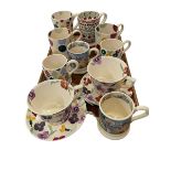 Collection of Emma Bridgewater ceramics including cups, mugs and saucers.