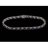 Sapphire and diamond multi stone bracelet set in 18 carat white gold, 17.5cm long.