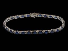 Sapphire and diamond multi stone bracelet set in 18 carat white gold, 17.5cm long.