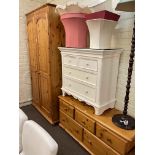 Pine finish double door wardrobe, five drawer low chest and white washed four drawer chest (3).