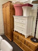 Pine finish double door wardrobe, five drawer low chest and white washed four drawer chest (3).