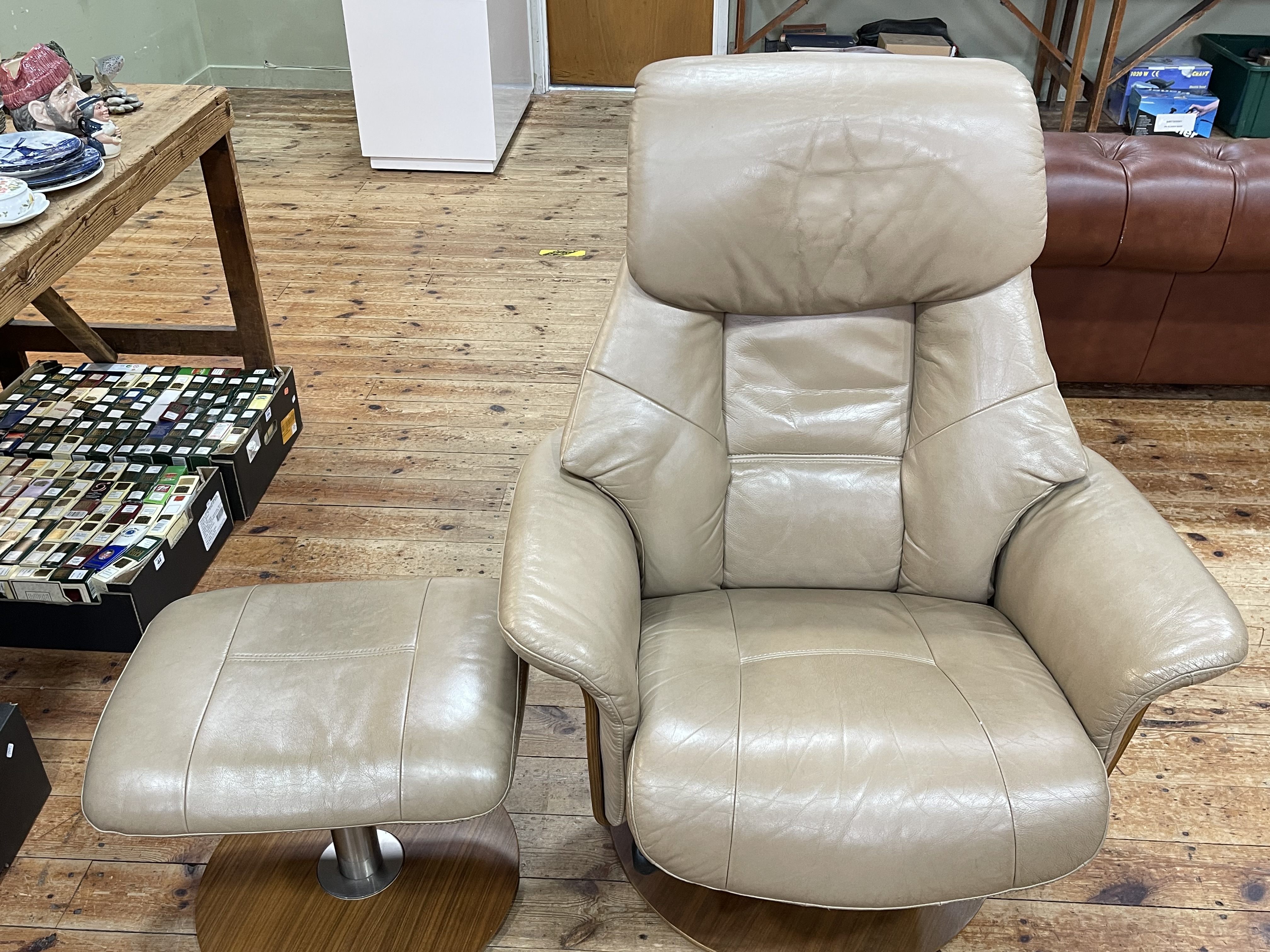 Zedere mink leather reclining chair and footstool.