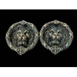 Pair cast metal lion mask door knockers, 22cm diameter.