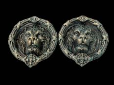 Pair cast metal lion mask door knockers, 22cm diameter.