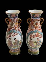 Pair of Chinese porcelain two handle vases, having panels of figure decoration, 26.5cm.