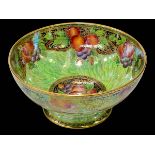 New Hall lustre bowl decorated with fruit signed Lucien Boullemier.