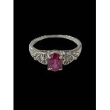Ruby and diamond 9 carat white gold ring, size P.