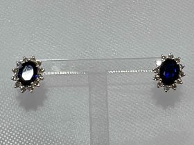 Pair of sapphire and diamond earrings, the central oval sapphires 2.