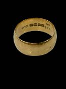 18 carat gold wedding band ring.