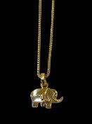 18 carat gold elephant pendant and chain.