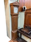 Oak cased 30 hour longcase clock having earlier square painted dial, 205cm.