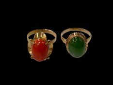 Two 14k gold rings, coral and green stone.