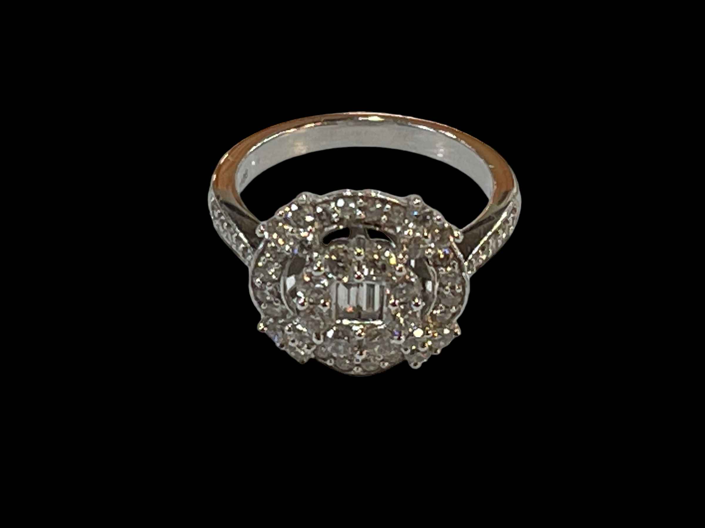 Fancy set diamond cluster ring having two central baguette diamonds surrounded by two rows of