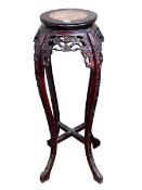 Oriental carved hardwood and marble inset jardiniere stand, 91cm.