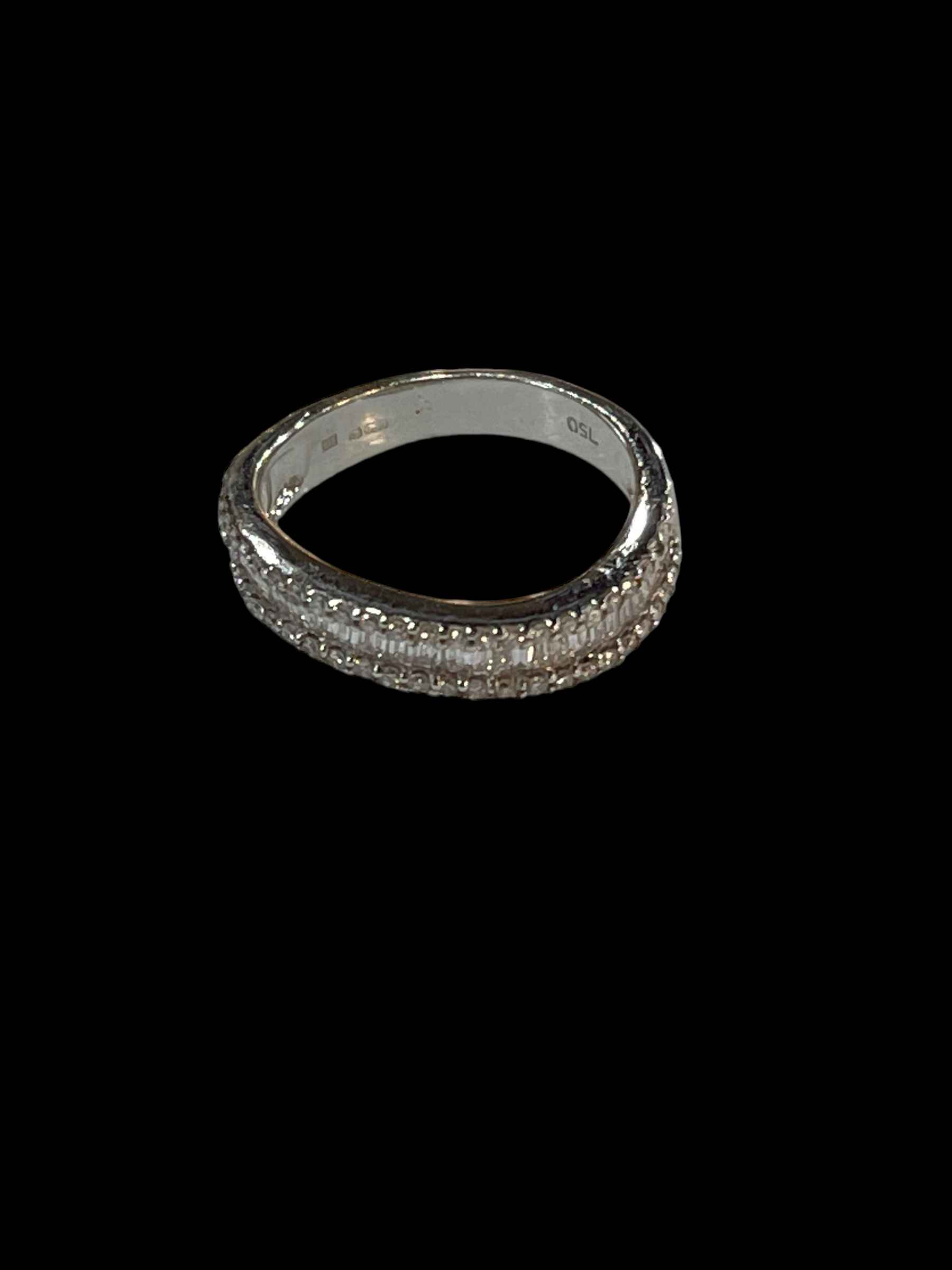 18 carat white gold and diamond three row half eternity ring, size L.