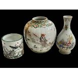 Three Chinese pieces comprising ginger jar, baluster vase and brush pot, largest 23cm.