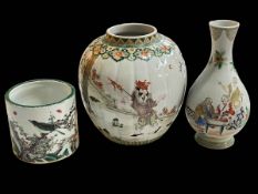 Three Chinese pieces comprising ginger jar, baluster vase and brush pot, largest 23cm.