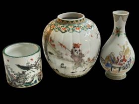 Three Chinese pieces comprising ginger jar, baluster vase and brush pot, largest 23cm.