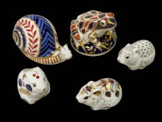 Five Royal Crown Derby paperweights including snail and frog.