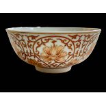 Chinese porcelain bowl decorated in iron red and gilt with bats and exterior stylised foliage,
