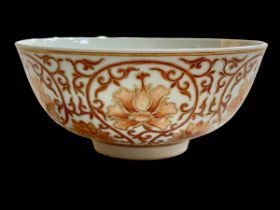 Chinese porcelain bowl decorated in iron red and gilt with bats and exterior stylised foliage,