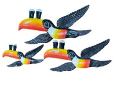 Three Toucan wall plaques.