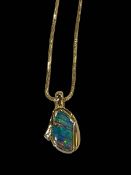 Opal and diamond 18 carat gold pendant with 18 carat gold chain necklace.