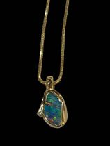 Opal and diamond 18 carat gold pendant with 18 carat gold chain necklace.