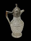 Good Victorian silver mounted crystal claret jug, embossed with scrolling foliage, Birmingham 1898,