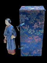 Boxed Chinese figure of lady in blue gown, 29cm.