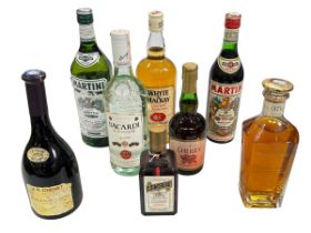 Eight bottles of spirits and wine including Robert Burns 70cl from the Arran Distillery,