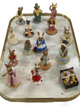 Fifteen Royal Doulton Bunnykins figures.