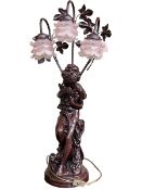 Large three branch figure table lamp with pink glass shades, 82cm.