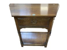 Bevan Funnell Ltd Reprodux oak canted corner single drawer hall table, 76cm by 84cm by 41cm.