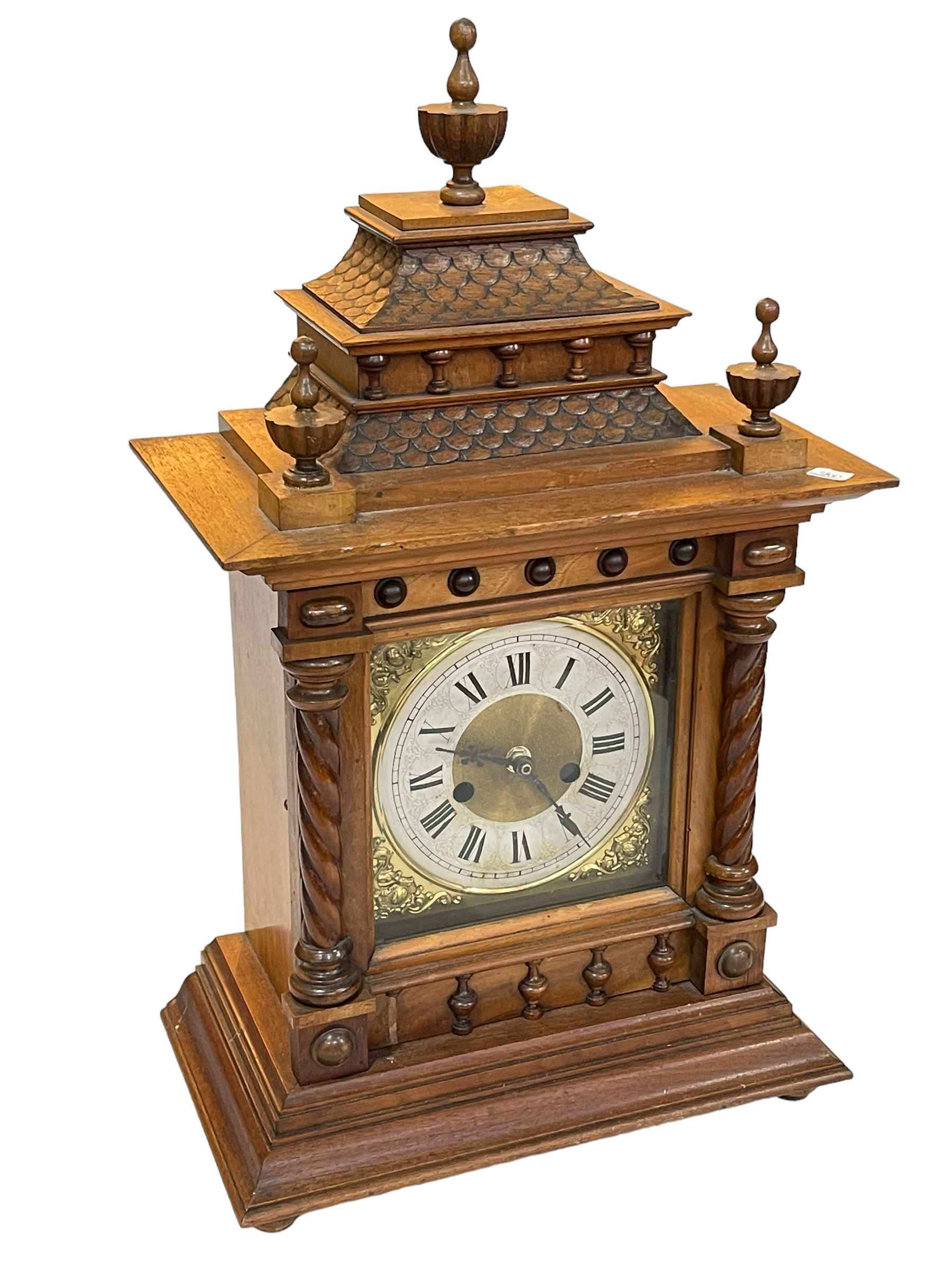 Victorian oak Gothic style mantel clock with brass and silvered dial, 56cm high.
