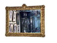 Rectangular gilt framed bevelled wall mirror, 68cm by 85cm.