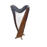 Harp, harp case and spare strings.