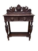 Victorian carved oak two drawer hall table, 103cm by 75cm by 30cm.