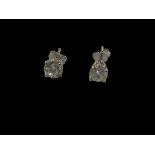 Pair diamond stud earrings set in 18 carat white gold, total diamond weight approximately 1.5 carat.