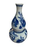 Large Chinese double gourd vase decorated with figures and landscape scenes, 41cm high.
