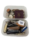 Box of coins and box of pocket knives.