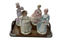 Four Royal Worcester limited edition '19th Century Walking Out Dresses' figures.