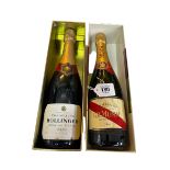 Two bottles of champagne, Bollinger Special Cuvee and GH Mumm Brut.