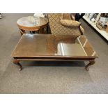 Chippendale style rectangular low centre table on cabriole legs, 42cm by 138cm by 67cm.