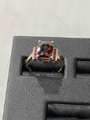 Garnet 9 carat gold ring, size S.