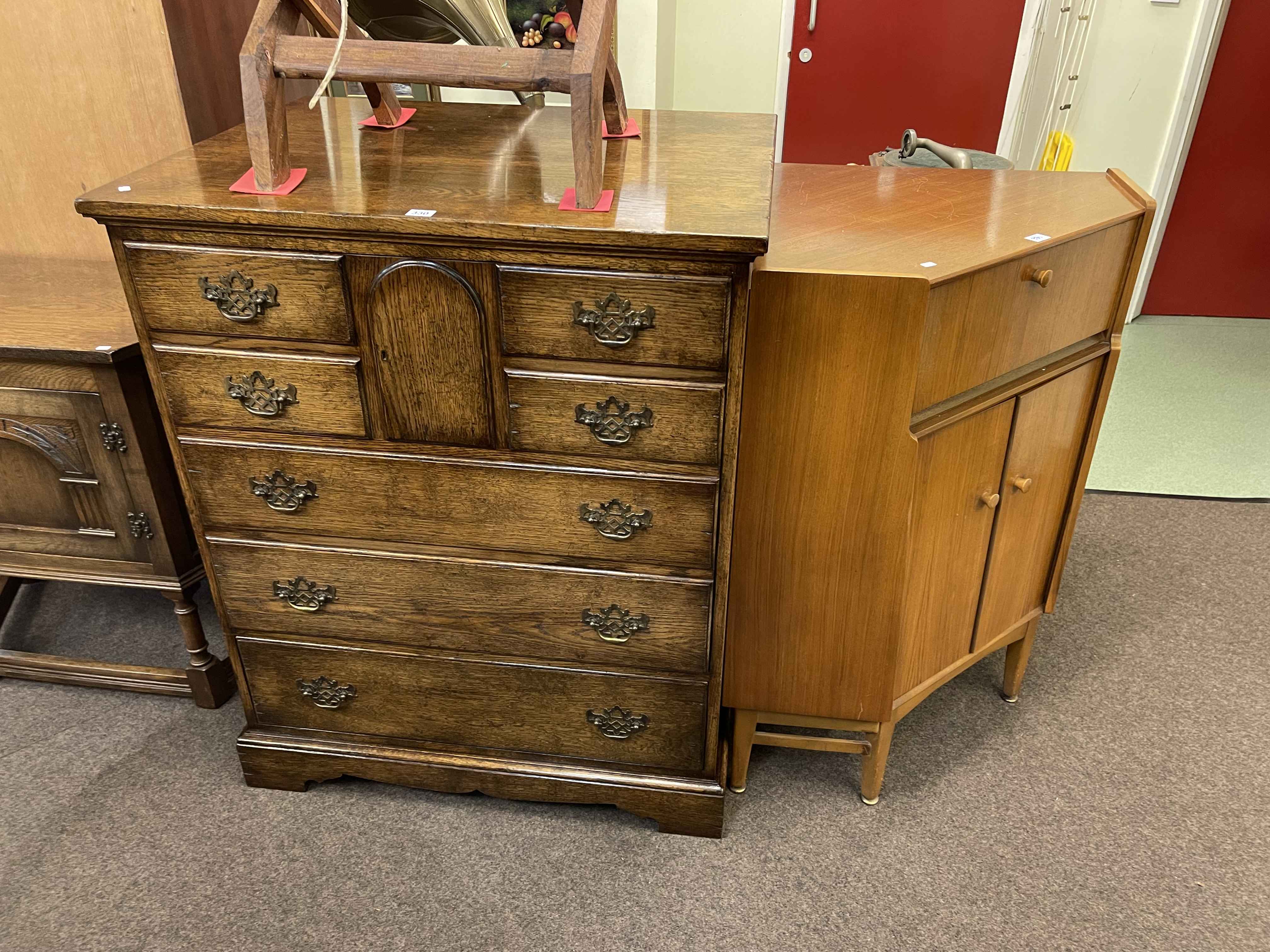 Oak entertainment cabinet in the form of a Georgian chest together with a Nathan Mid Century corner