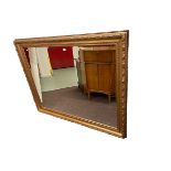 Large rectangular gilt framed bevelled wall mirror, 153cm by 122cm.