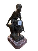 Art Deco style bronze seated lady on a marble plinth.